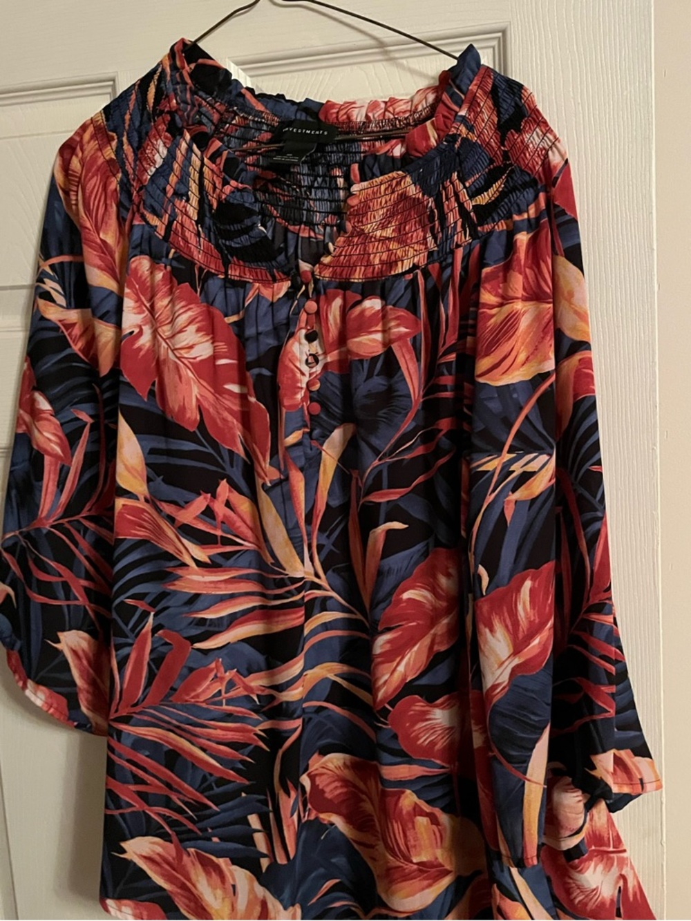 INVESTMENTS Navy and Coral Floral Smocked neck top